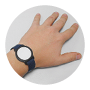 Hand with a black smartwatch displaying a blank white screen on the wrist against a white background.