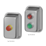 Zwei rechteckige Edelstahlgehäuse: links mit rotem Not-Halt-Schalter, rechts mit rotem und grünem beleuchtetem Drucktaster