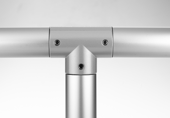 Metallic 90-degree angle T-connector with three hex socket screws connecting three cylindrical tubes forming a T-joint