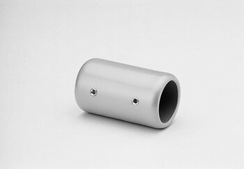 Silver cylindrical metal tube connector with two hexagonal screws on its side, placed on a white surface