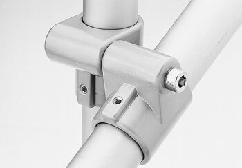 Close-up image showing a single-layer open tube connector securing three metal tubes with hexagonal socket screws