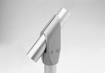 Metallic T-shaped tube connector joining three cylindrical tubes at an angle between 45 and 135 degrees with two-piece sleeve fixed by screws